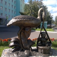 Аист с ребенком